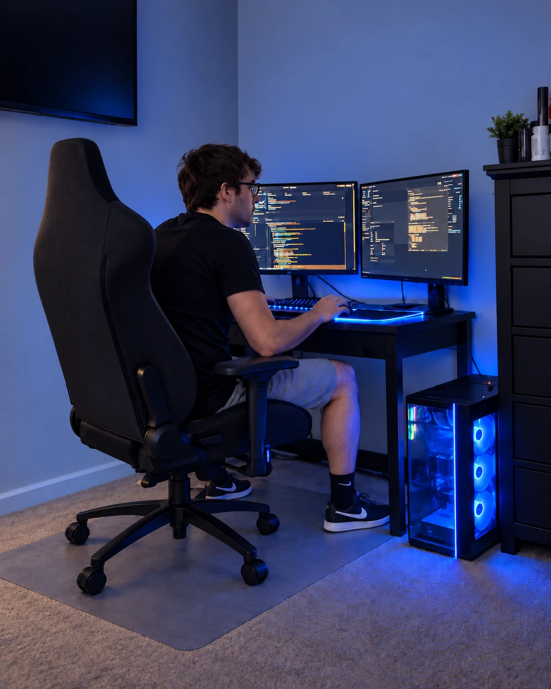 Founder developing trading software at his workstation